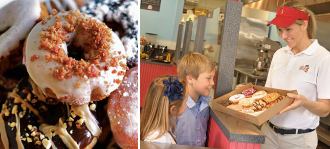 employee serving kids donuts at duck donuts