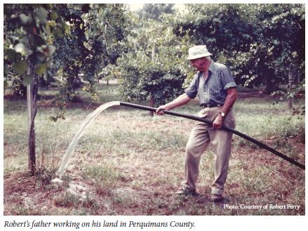 Robert’s father working on his land in Perquimans County.