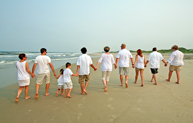 Large family walking on the beach of the Outer Banks North Carolina