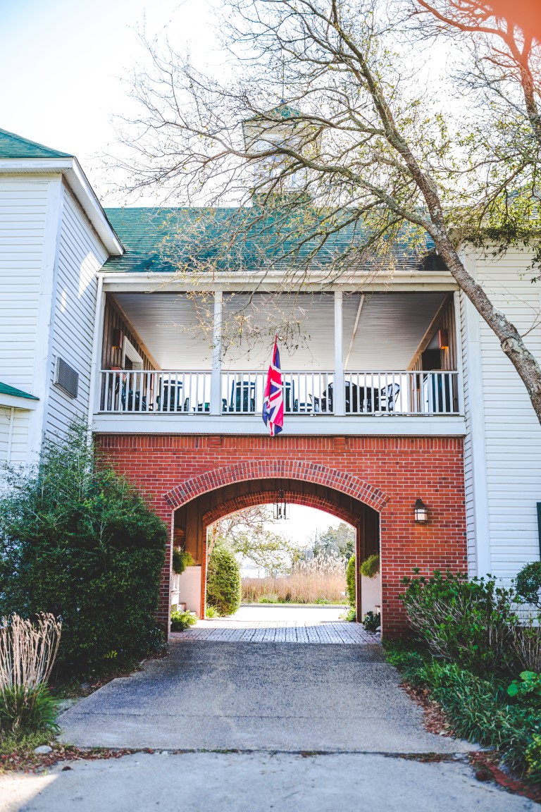 Inn Exterior Showing Breezeway and Porch Above