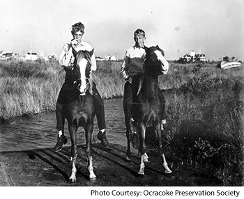 Boys on Banker Ponies on Ocracoke Island NC