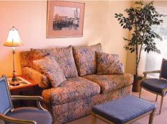 Seating area in a Captain's Landing suite