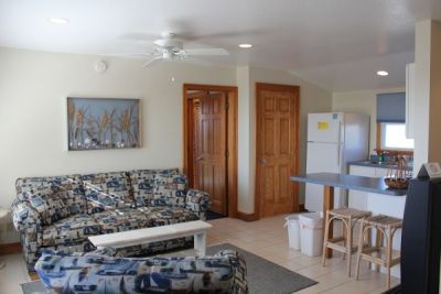 Sitting area of poolside room at Pony Island Motel