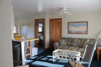 Sitting area of poolside room at Pony Island Motel