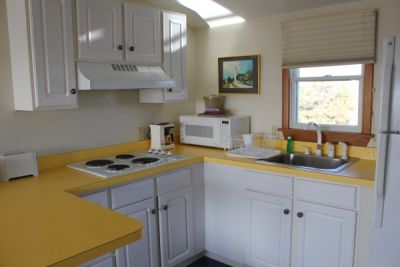 Kitchen of poolside room at Pony Island Motel