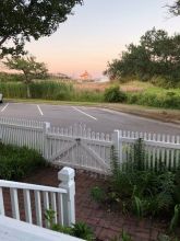 Water View from the Inn with White Picket Fence